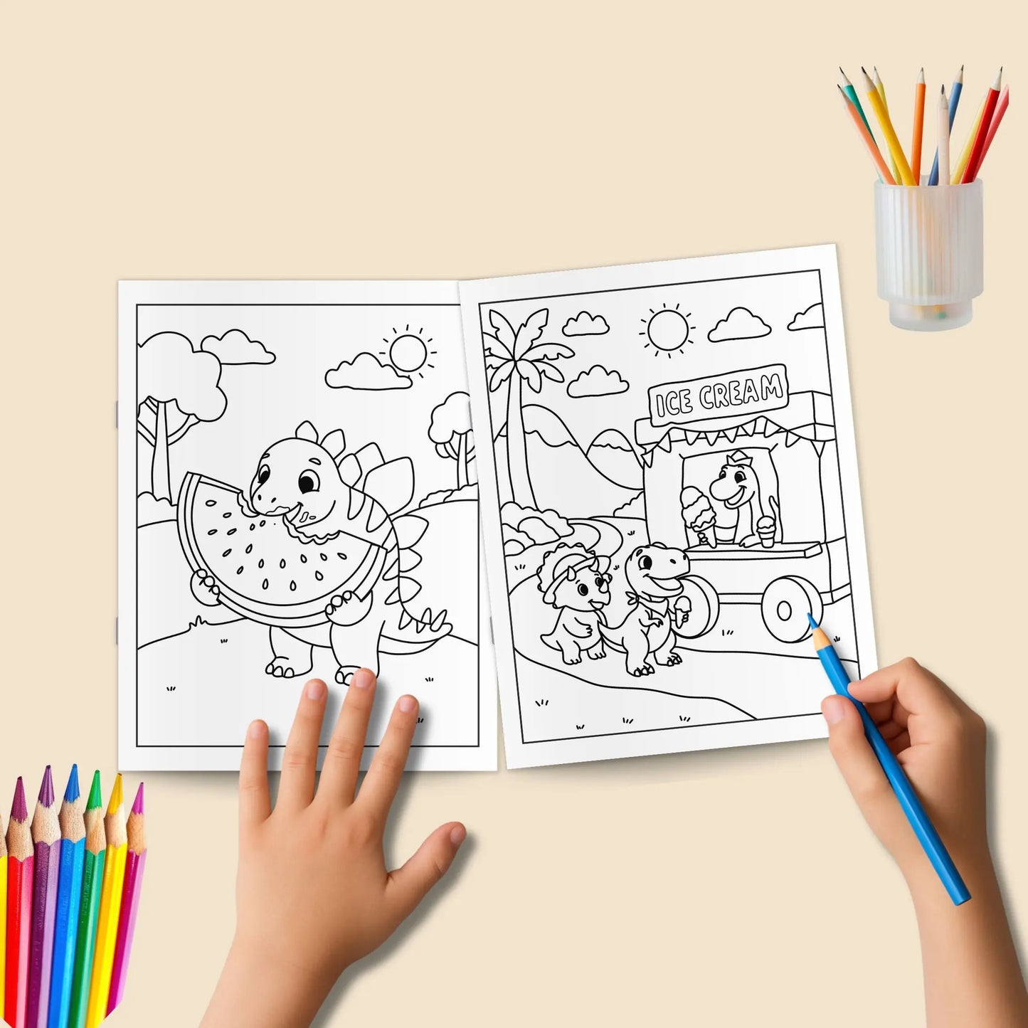 Two coloring pages with dinosaur illustrations on a table with coloring pencils.